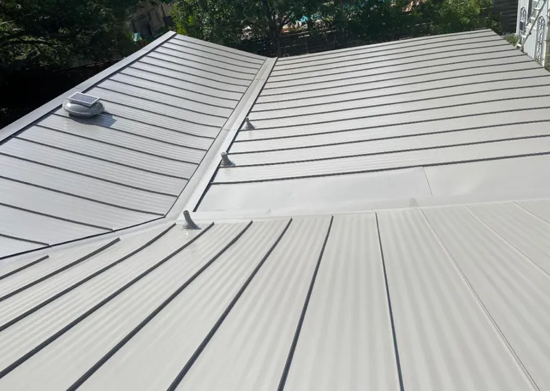 Solar attic fan installed on a metal roof for Roof Ventilation in Loomis